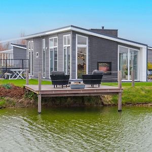Modern Chalet On The Water At A Holiday Park Wemeldinge Exterior photo